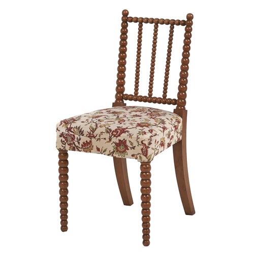 68 - A Victorian bobbin turned satin birch side chair, the stuffed over seat in the original floral chint... 