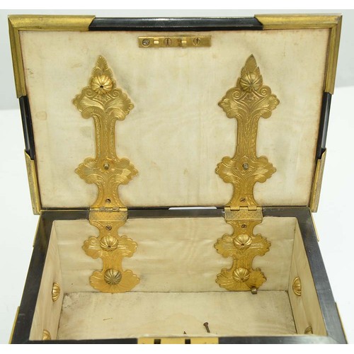 188 - A Victorian gilt brass mounted ebony jewel casket, the pierced and engraved mounts and studs to the ... 