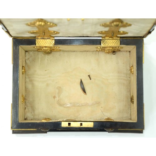 188 - A Victorian gilt brass mounted ebony jewel casket, the pierced and engraved mounts and studs to the ... 