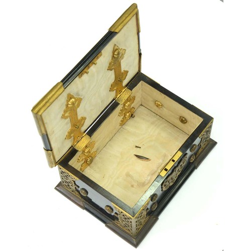 188 - A Victorian gilt brass mounted ebony jewel casket, the pierced and engraved mounts and studs to the ... 