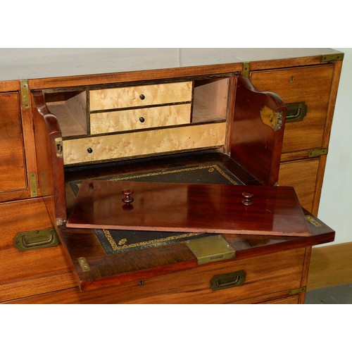 1337 - A Victorian brass mounted mahogany military chest of drawers, in two sections, the secretaire to the... 