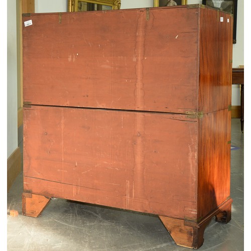 1337 - A Victorian brass mounted mahogany military chest of drawers, in two sections, the secretaire to the... 