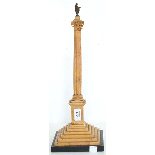 179 - An Italian marmo giallo siena model of the Column of Phocas, Rome, c1840, with miniature bronze stat... 