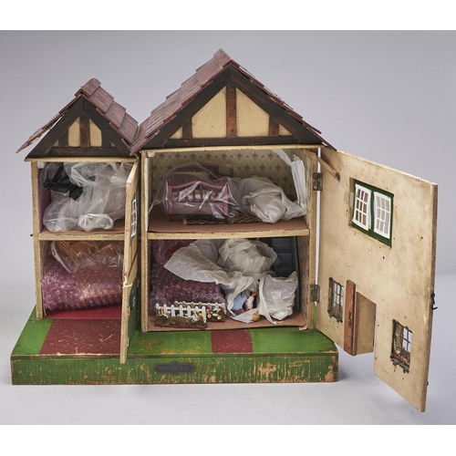 584 - A painted wood twin gabled doll's house, second quarter 20th c, 45cm and a quantity of contemporary ... 