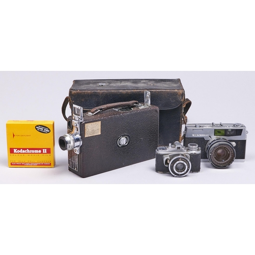 589 - An Eastman Kodak  16mm Cine-Kodak camera, model K  11933-1946,  with maker's f1.9, 25mm lens, with i... 