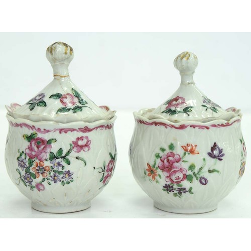 283 - A pair of Chinese export porcelain famille rose artichoke custard cups and covers, c1770, painted wi... 