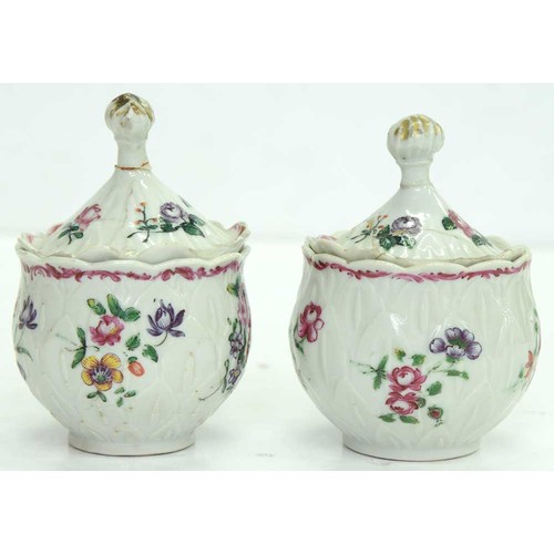 283 - A pair of Chinese export porcelain famille rose artichoke custard cups and covers, c1770, painted wi... 