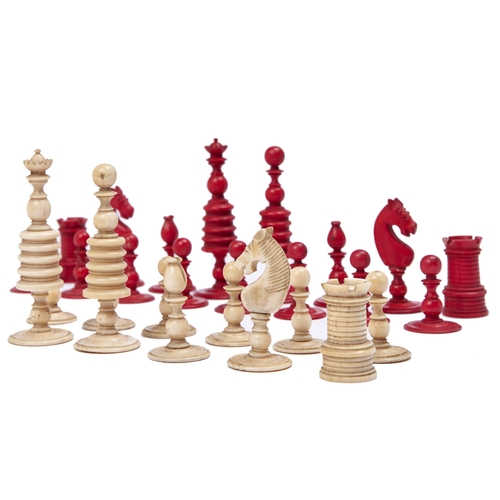 371 - A Victorian bone chess set, stained red and natural, kings 95mm h