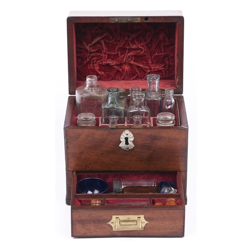 433 - A Victorian mahogany domestic medicine chest, with fitted interior and drawer, containing various ac... 