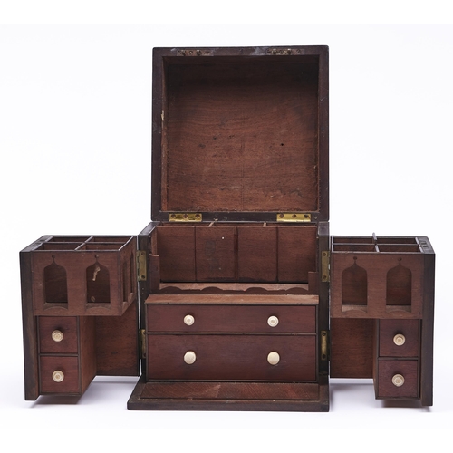 456 - A Victorian mahogany folding domestic medicine chest, with flush brass handles and two escutcheons, ... 