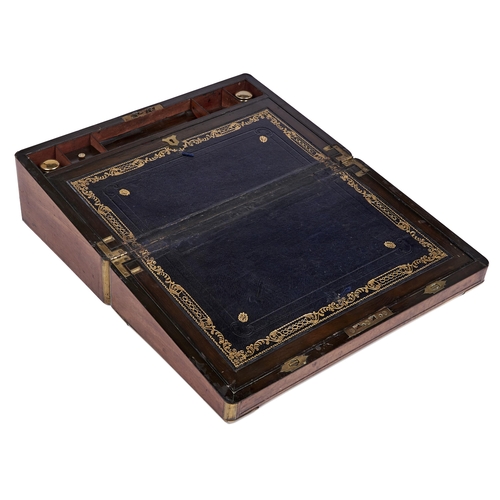 486 - A Victorian brass mounted walnut writing box, the fitted interior with gilt tooled navy writing surf... 