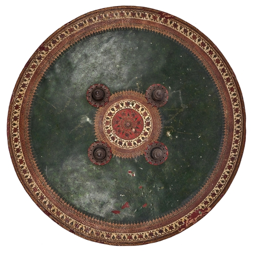 512 - An Indian lacquered hide shield, dhal, 19th c, of slightly convex form, the central red tooled round... 