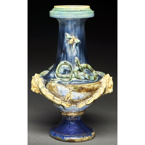 64 - A French Palissy ware vase, late 19th c,  applied with festoons and lion mask handles and, to either... 