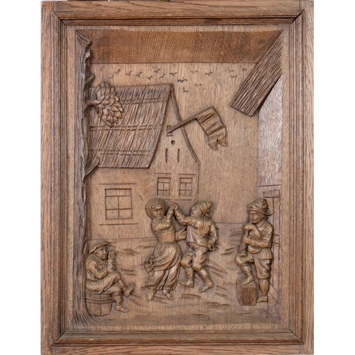 733 - A pair of Northern European oak panels carved with Dutch peasant scenes, early 20th c, in 17th c sty... 