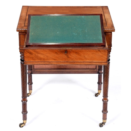 789 - A George IV mahogany and ebony line inlaid work table, the rectangular top incorporating a cheval sc... 