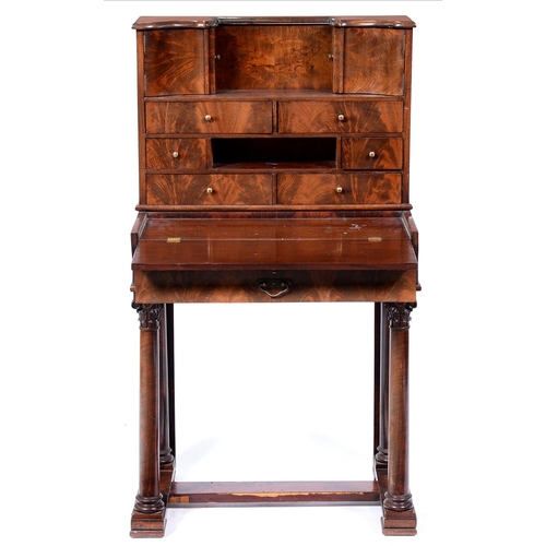 836 - A French mahogany writing table, 20th c, in Louis Philippe style, fitted with an arrangement of door... 