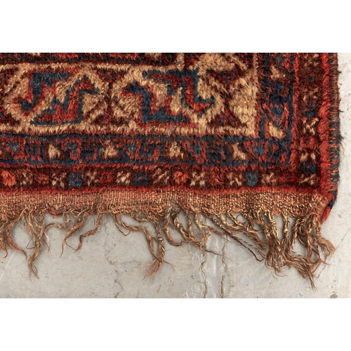 872 - An antique Caucasian rug, 112 x 172cm