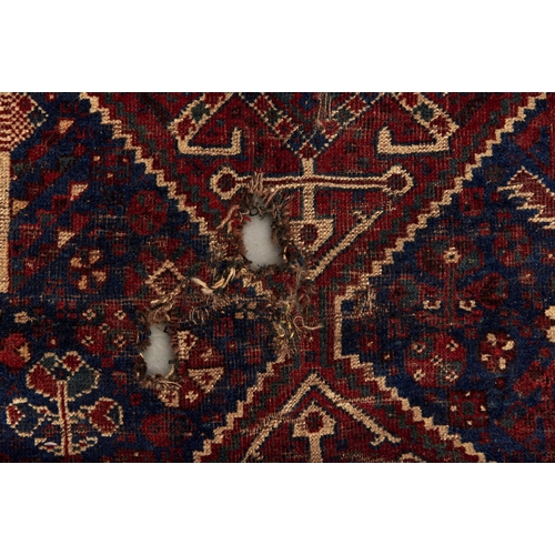 919 - An antique Caucasian rug, 175 x 254cm