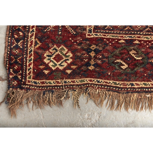 919 - An antique Caucasian rug, 175 x 254cm