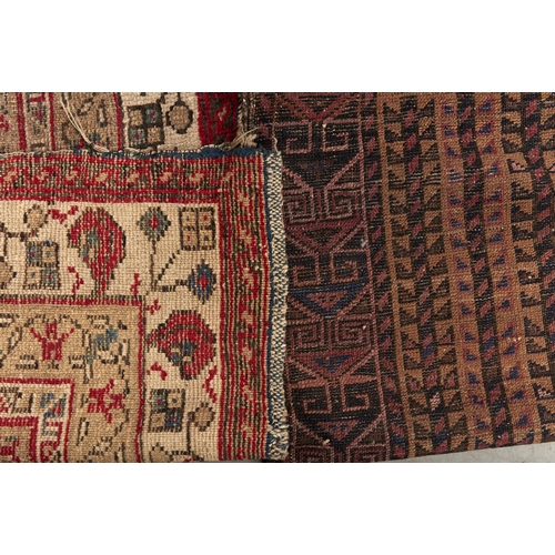 921 - An antique Caucasian rug, 70 x 125cm and another (2)