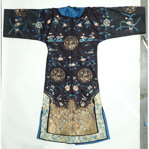 440 - A Chinese embroidered silk robe, early 20th c, approximately 130cm