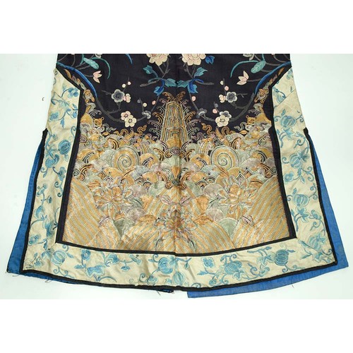 440 - A Chinese embroidered silk robe, early 20th c, approximately 130cm