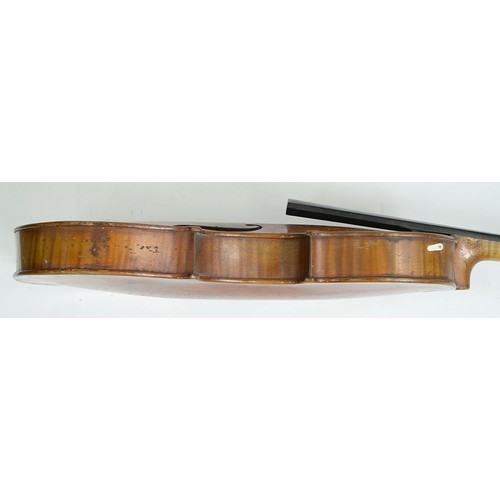 623 - A violin, early 20th c, with one-piece back, length of back 36cm, two tennis rackets, a small leathe... 