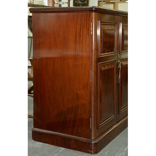 829 - A Victorian mahogany plate cupboard, the interior baize lined, enclosed by a pair of doors with rais... 