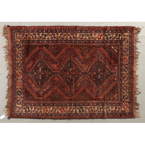 1348 - An antique Caucasian rug, 112 x 172cm