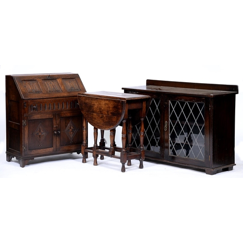 1376 - An oak bureau, the flap with linenfold panel, 92cm h; 41 x 96cm, an oak gateleg table and a stained ... 