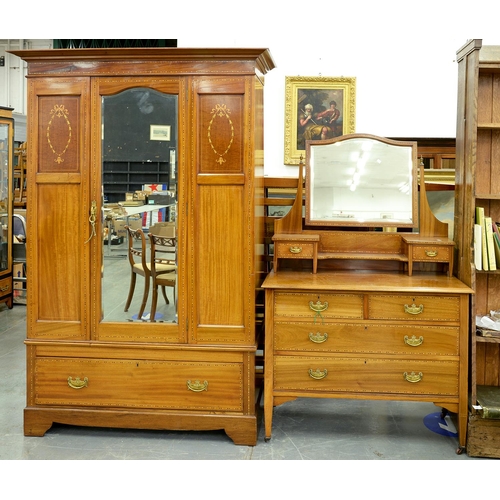 1385 - An Edwardian mahogany and inlaid three piece bedroom suite, comprising wardrobe, 130cm l, dressing t... 