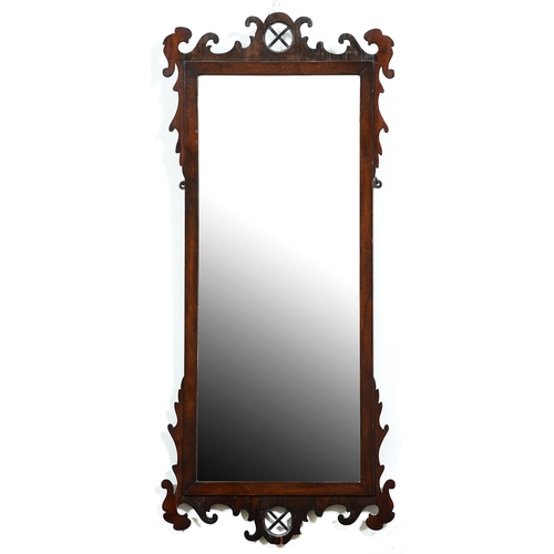 1135 - A mahogany fretted frame mirror, late 19th / early 20th c, in George II style, 128 x 55cm... 