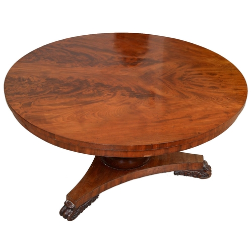 1242 - An early Victorian mahogany  breakfast table, the figured  top  on octagonal baluster pillar with tu... 