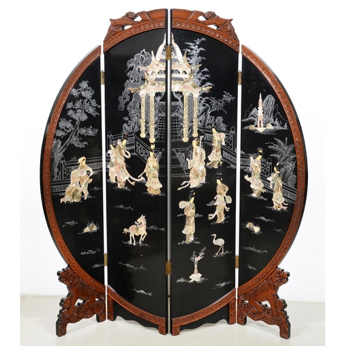 1253 - A South East Asian lacquer screen, black lacquer panels decorated with abalone, mother of pearl and ... 