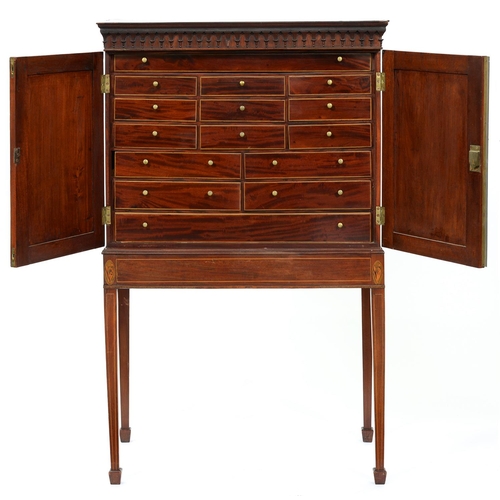 1275 - A George III mahogany collector's cabinet, crossbanded and line inlaid, with pear drop frieze and fi... 