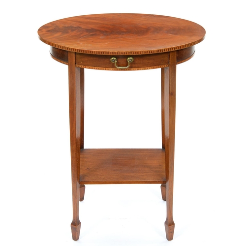 1289 - An Edwardian oval mahogany occasional table, the edge of the figured top and frieze with dentil inla... 