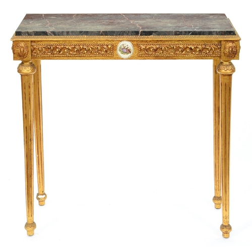 1291 - A reproduction gold painted marble topped side table, in Louis XVI style, on fluted tapered legs, 82... 