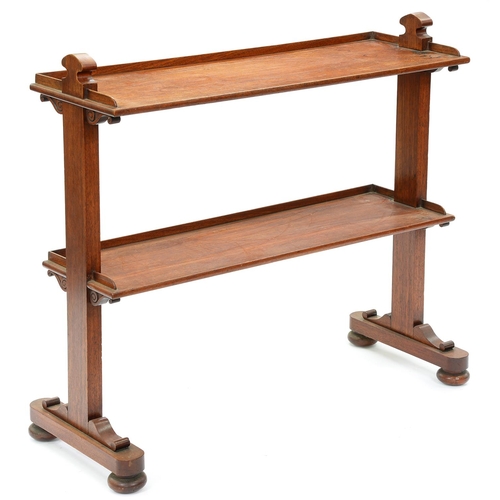 1297 - A Regency mahogany dumb waiter, of two rectangular galleried tiers between plain uprights, on bun fe... 