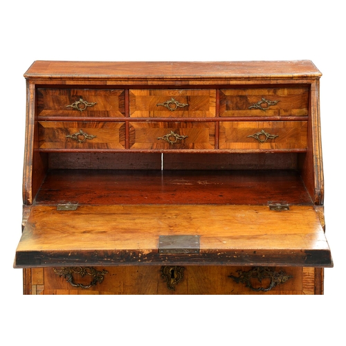 1316 - An Italian walnut bureau, c1760, crossbanded throughout, the figured, quarter veneered serpentine fl... 