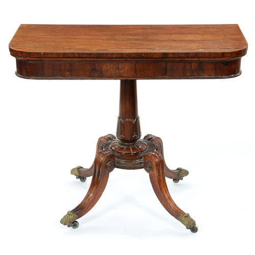 1319 - A Victorian rosewood card table, with crisply carved lotus pillar and helix on four scrolling moulde... 