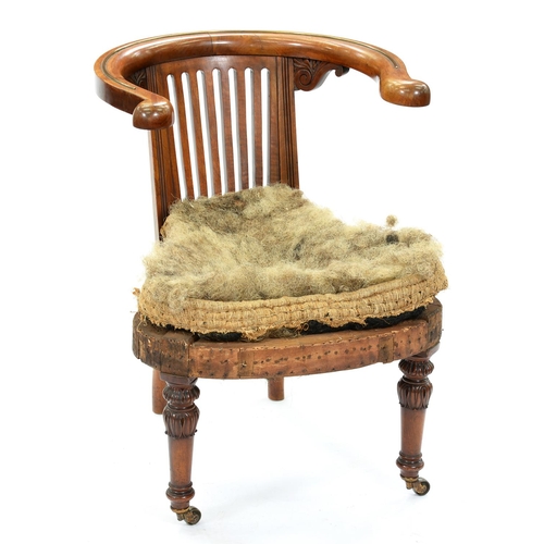 1339 - A William IV walnut library chair, attributable to Morgan & Sanders, the arm bow with partly rec... 