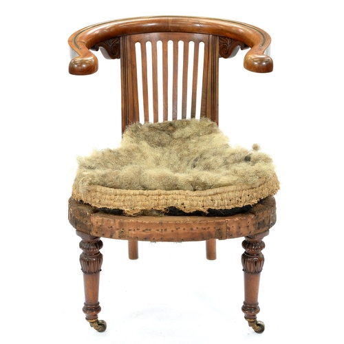 1339 - A William IV walnut library chair, attributable to Morgan & Sanders, the arm bow with partly rec... 