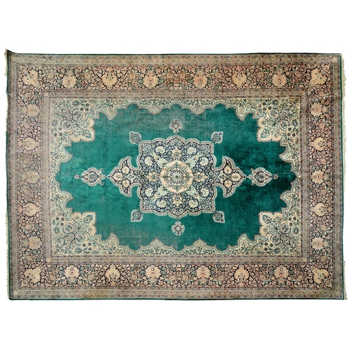 1362 - A Persian green ground medallion rug, 278 x 366cm