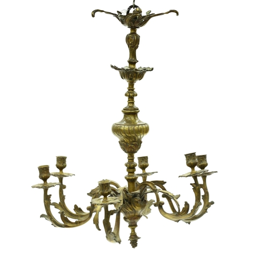 1379 - A brass chandelier, 19th c, in Louis XV style, the six leafy scrolling branches with conforming scon... 