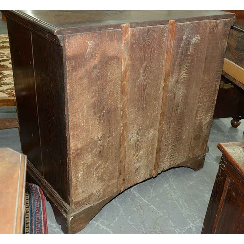 1307 - A George III oak chest of drawers, c1780, the rectangular top with moulded lip above two short over ... 