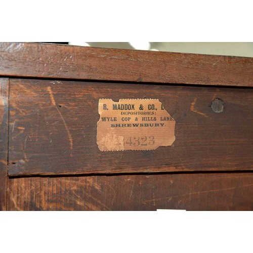 1351 - A George IV rosewood breakfront bookcase, with reel mouldings and fitted with shelves enclosed by pa... 