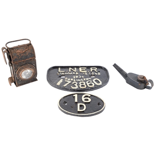 535 - A cast iron plate, 1934 Darlington, No 173860 and a cast iron 16/D, a painted tinplate lamp and a fl... 