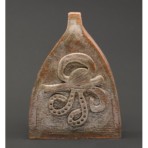 126 - Studio Pottery. A bottle oven shaped lamp, 1970's, hand built saltglazed brown stoneware with applie... 