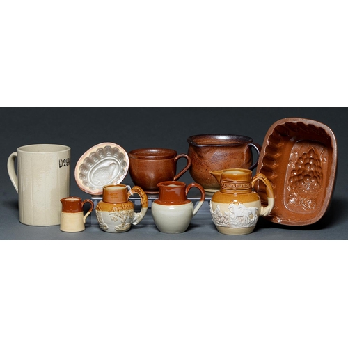 127 - Two Derbyshire saltglazed brown stoneware handled pots, Chesterfield, early-mid 19th c, 70 and 90mm ... 