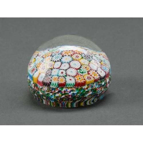 143 - A glass millefiori paperweight, 20th c,  80mm diam